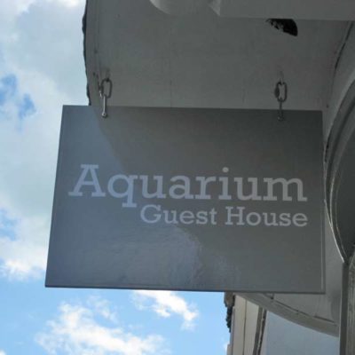 Aquarium Guest House Sign